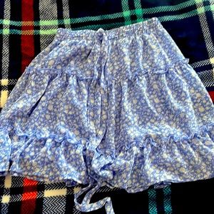 blue and white skirt with a flower pattern